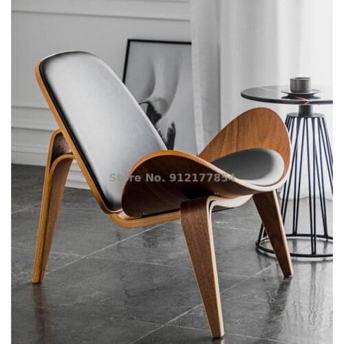 Designer creative single shell chair modern minimalist backrest sofa chair Nordic leisure multi-layer walnut chair
