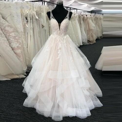 On zhu Sleeveless A-line Wedding Dress V Neck Sexy Backless Bridal Gown Vestido De Novia Ruffle Skirt Wedding Dresses 2022