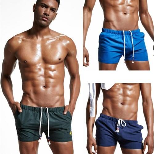 New fashion 2020 Man boxers Shorts mens summer casual quick dry shorts Solid color loose trouser beach shorts Swimsuit size XXL