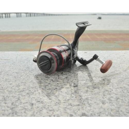 2020 New Fishing coil Wooden handshake 12+ 1BB Spinning Fishing Reel Professional Metal Left/Right Hand Fishing Reel Wheels