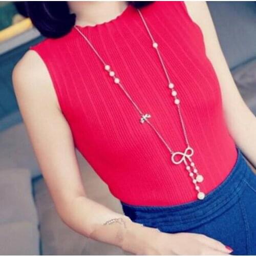 2018 hot sale New simple wild fashion exquisite alloy imitation pearl crystal bow pendant necklace Female charm sweater chain
