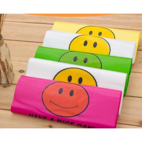 4 sizes 50pcs Supermarket Lovely Smile yellow pink Vest Plastic Carrier Shopping bag with handle plastic Hand Bag Packaging Bag