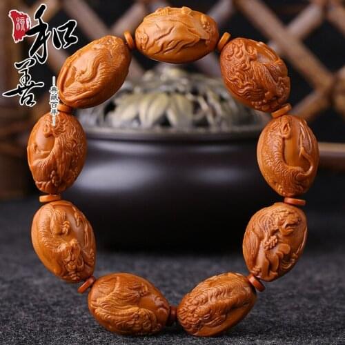 Olive nuclear carving embossed tiger Wushan forest hand string play put play olive hu handchair male and good olive core