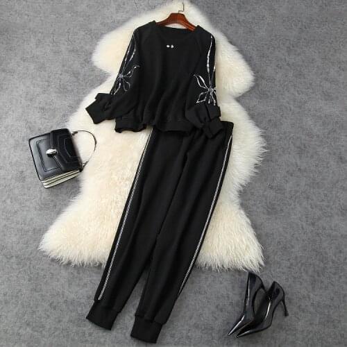 Europe and the United States womens clothing in the winter of 2021 new long-sleeve sequins hoodie nine minutes of pants fashion