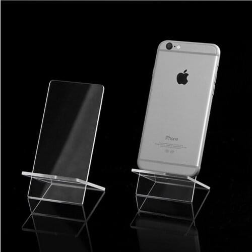 Hot selling Clear Acrylic 1 Layer Cross Ornaments Display Shelf Mobile Cellphone Wallet Sun Glasses Rack Jewelry Display Shelf