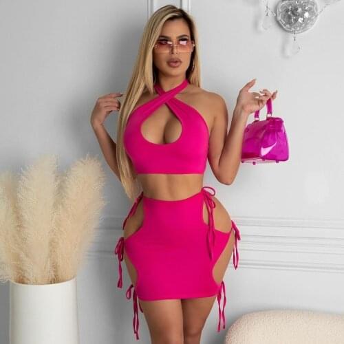 RMSFE 2021 Nightclub Party Sexy Sleeveless Hanging Neck Hollow Out Pure Color Short Vest + Tight Hole Skirt 2 Piece Womens Set