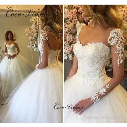 Illusion Tulle Wedding Dress 2021 New Quality Lace Appliques Full Sleeves Sweept Train Dubai Bride Dresses Plus Size W0353