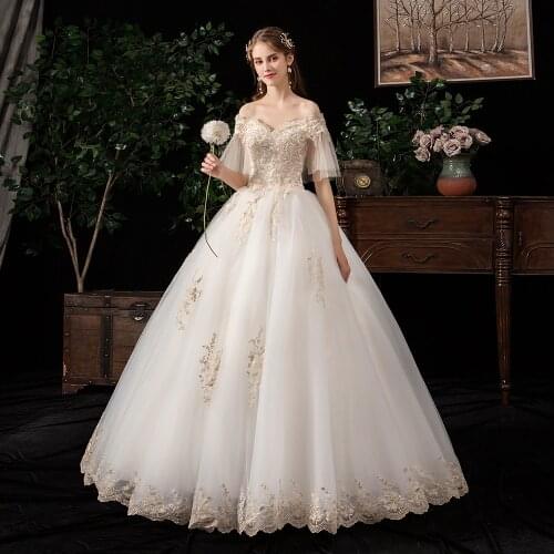 Light Champange Short Sleeves Boat Neck Beads Lace Ball Gown Wedding Dresses Bridal Celebrity vestido De Noiva robe de mariee