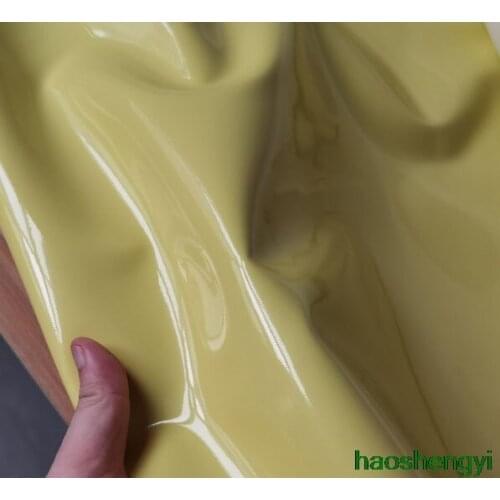 Stiff mirror leather cloth yellowish shiny leather fashion fabric