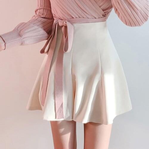 Half-length skirt 2021 spring and autumn new solid color flared skirt high waist large size A-line short skirt pleated skirt