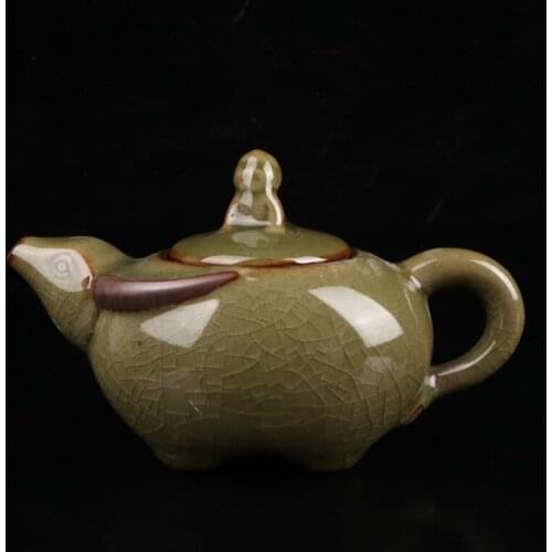 China Cyan glaze ceramic shepherd boy ride cow teapot crafts statue