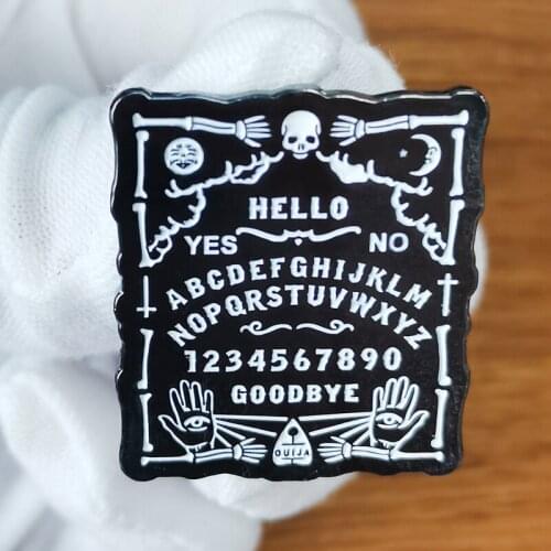 Ouija Board Enamel Pin So you wish to communicate with the dead? Collect it
