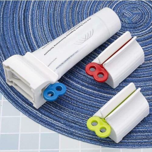 Hot Bathroom Plastic Cream Tube Squeezing Dispenser Rolling Tube Squeezer Tooth Paste Squeezer Toothpaste Dispenser