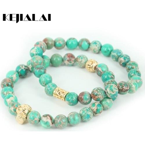 KEJIALAI 2pcs High Quality Mix Style Natural Regalite Round Stone Beads Men Bracelet Beaded Skull Head Women Bracelet A0585