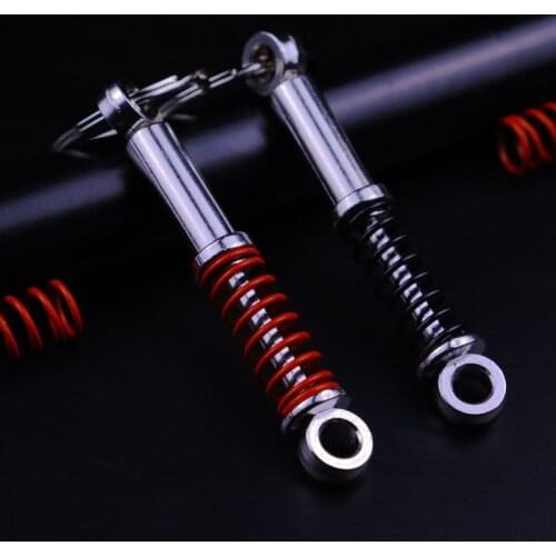 New Fashion Car Shock Absorber Keychain for Car Lovers Creative Unisex Car Bag Metal Spring Keyrings Pendant Gifts
