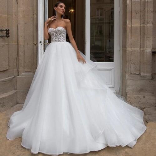 Elegant Glitter Tulle Wedding Dresses Custom Made Sweetheart Sleeveless Sparkling Applique Ball Gown Bridal Dress