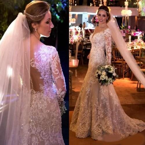 2020 Mermaid Lace Wedding Dresses With Appliques Sequins Long Sleeves Wedding Gowns Sweep Train Sheer Back Covered Buttons Brida