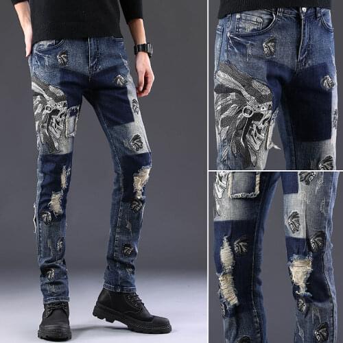 Skull embroidered color-matching jeans mens hole in winter thick elastic stretch slim feet tide brand patch trousers jeans ker