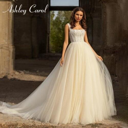 Ashley Carol A-Line Wedding Dress 2021 Classy Strapless Beaded Appliques Bride Spaghetti Straps Backless Princess Bridal Gown