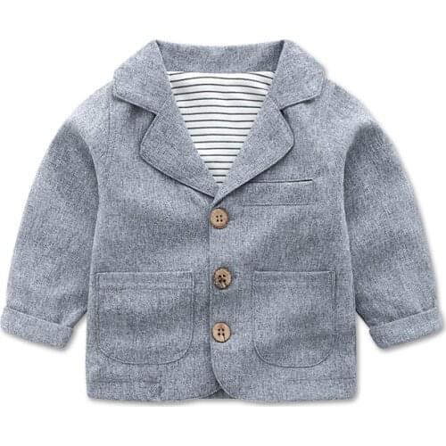 Baby boy darling goes out in a gentlemans little coat