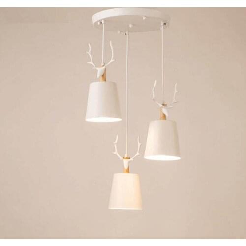 Nordic restaurant chandelier three head personality creative simple chandelier deer head warm modern simple dining chandelier