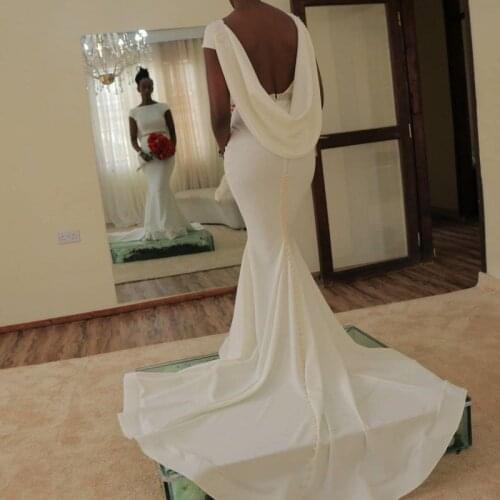 JIERUIZE White Simple Backless Mermaid Wedding Dresses Short Sleeves Pearls Summer Bridal Wedding Gowns