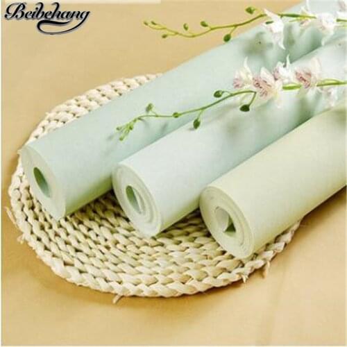 Beibehang Light green plain color nonwovens wallpaper bedroom warm and simple modern living room fashion fresh wallpaper