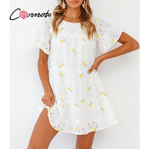 Conmoto Hollow out yellow flower holiday dress Cotton short sleeve embroidery dresses Holiday beach boho dresses summer 2021 new