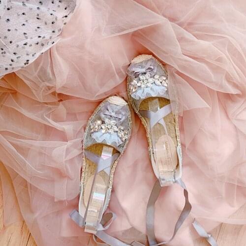 Summer new round-toe straw woven flat shoes Baotou pregnant women cross strap sandals lace leisure fisherman shoes women