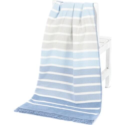 Floretta Cotton Throws On The Sofa