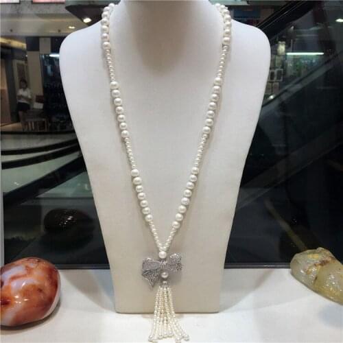 Hot sell 75cm White freshwater pearl micro inlay zircon bowknot long tassel sweater chain necklace fashion jewelry