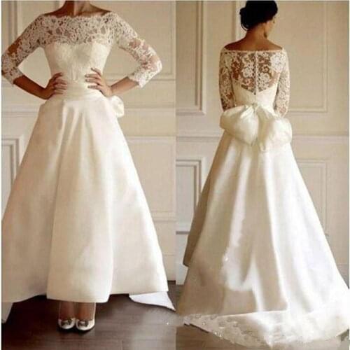 Ivory 2020 Bateau Short in front long Wedding Gowns 3/4 Sleeves Lace Wedding Gowns High Low With Big Bow Bridal Gowns Vintage