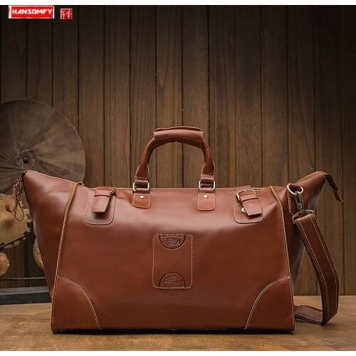 First layer cowhide Leather short-distance travel bag mens business trip handbag shoulder bag large-capacity luggage bag tide