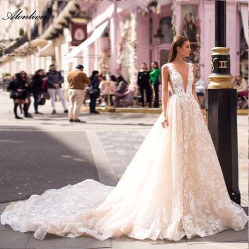 Alonlivn Whole Beading Embroidery Appliques Lace Wedding Dress Deep V-Neck And Backless Long Train Bridal Gowns
