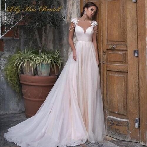 Elegant Boho Wedding Gowns 2020 Sheer Bateau Neck Cap Sleeves Beading Lace Appliques Blush Pink Bridal Gowns with Sash