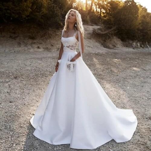 Elegant Champagne Wedding Dresses Spaghetti Straps Boho Vintage Tulle A-line Bridal Gowns With Pocket Back Lace Up Sleeveless