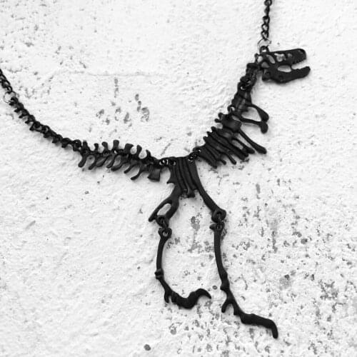 Necklace of dark dinosaur skeleton