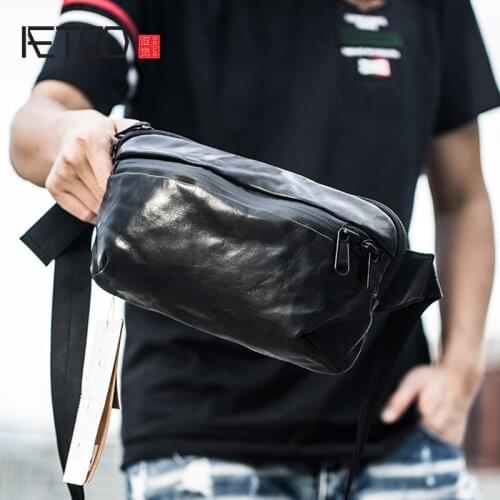 AETOO Vegetable tanned cowhide large-capacity chest bag, mens leather retro multifunctional crossbody bag