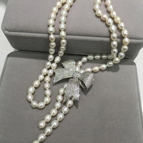 7-8MM long fresh water pearl necklace with bowknot pendant necklace rice shape pearl free shipping fashion women jewelry