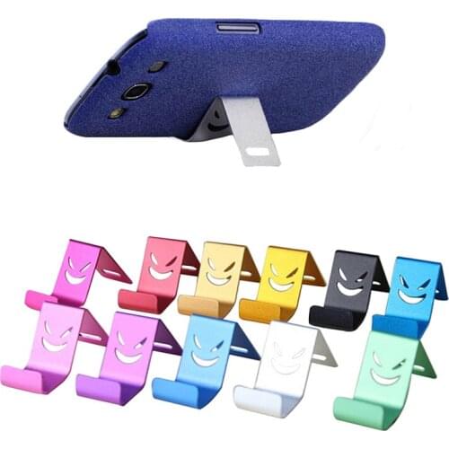 Universal Smile Mobile Phone Accessories Metal Mini Desktop Stand Table Cell Phone Holder For IPhone/Samsung/Xiaomi/Huawei