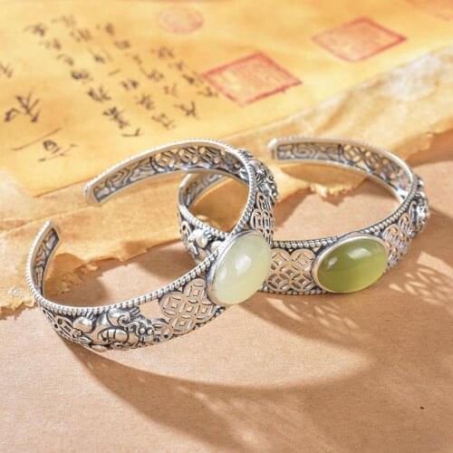 Original design natural Hetian jade hollow pattern craftsmanship ingot bracelet Chinese retro charm womens brand silver jewelry