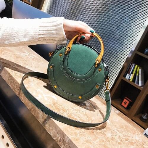 Wholesales fashion mini retro rivet matte leather women crossbody purses and handbags brand round shoulder bag for woman