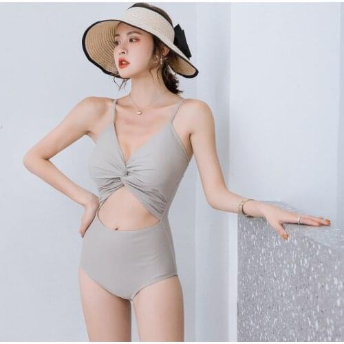 South Koreas new swimsuit womens twist bag high waist cover belly look thin sexy ins style French swimwear