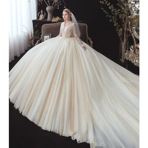 Luxury Long Sleeve Sequins Tassel Ball Gown Wedding Dresses 2020 Elegant Appliques Beaded Chapel Train Vintage Bridal Gowns