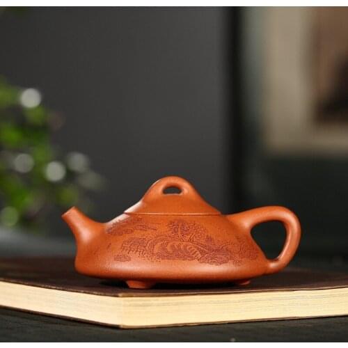 A child and metallurgy undertakes to manufacturers of purple clay all hand authentic small gifts customized the teapot