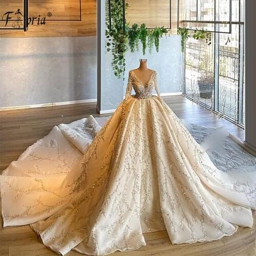 Luxury Wedding Dresses 2021 African Sparkly V-Neck Ball Gown Court Train Dubai Sexy Glitter Bridal Robe Do Mariee Custom Made