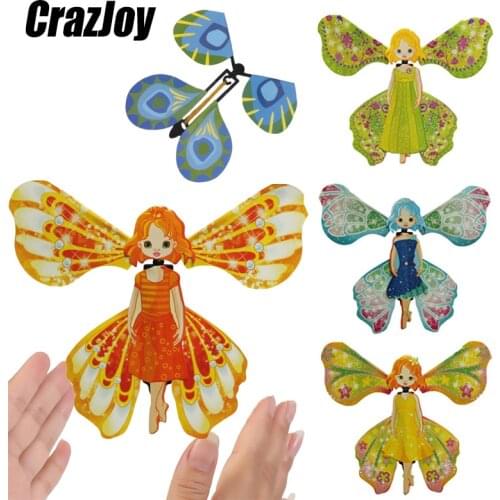 Flying in the Book Fairy Rubber Band Powered magic tricks props Wind Up Surprise Birthday Wedding Card Gift Cool stuff Butterfly