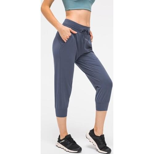 NWT 2011 Women Crop Running Active Lounge Jogger Capris with Side pockets Naked Feeling Leggings Drawstring waist good quality