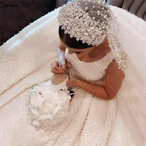Amazing Pearls Beaded Wedding Dresses V Neck Sleeveless Heavy Beading Luxury Bridal Gowns Dubai Saudi Arabia Vestido De Novia