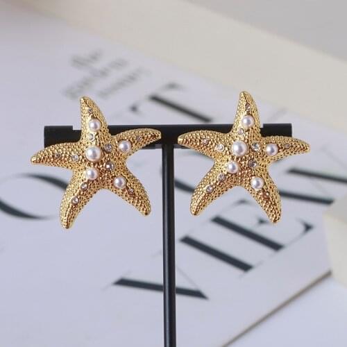 Little fresh sea star stereo starfish shape inlaid pearl girl heart simple earrings girl